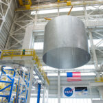 completed friction stir welded cryogenic tank section being lifted with crane