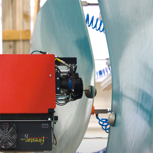 Configurable, robotic fixture conducting laser scrubbing of a composite component.