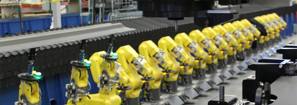 Row of configurable robotic fixtures